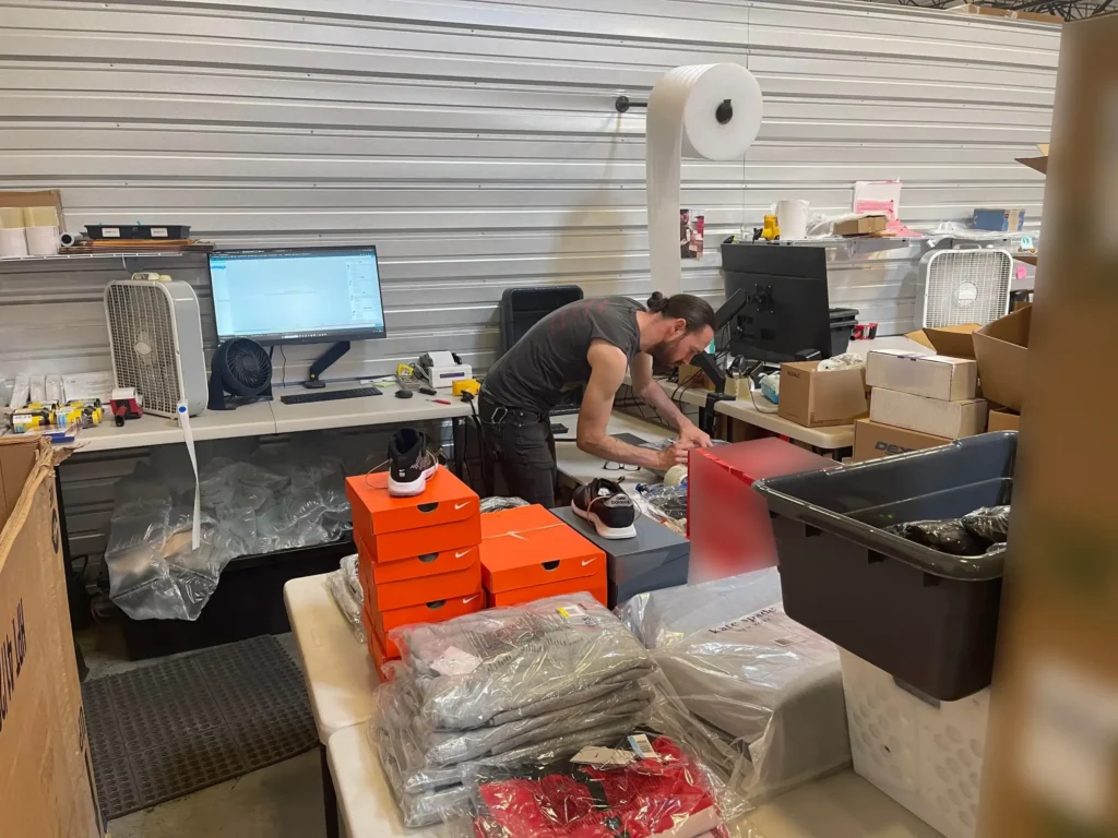 Warehouse employee packing products for same-day fulfillment